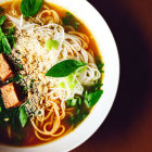 Traditional Vietnamese Pho Bowl with Rice Noodles and Beef Slice