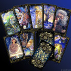 Richly Illustrated Tarot Cards on Dark Blue Cloth Background