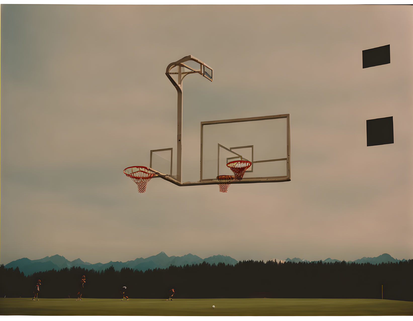 Clear backboard basketball hoop in serene outdoor setting with players and dusky sky