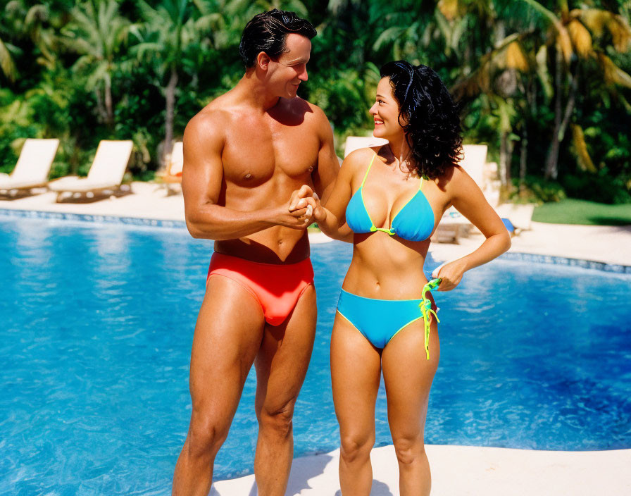 Couple in Swimwear by Pool with Tropical Plants