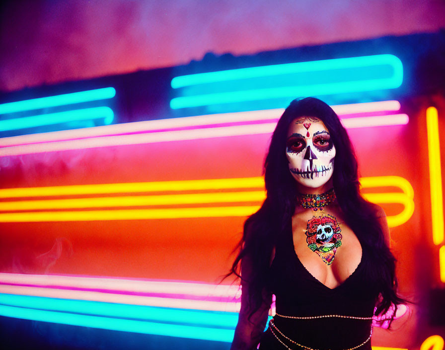 Woman with Day of the Dead makeup under neon lights