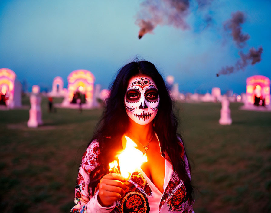 Skull Face Makeup Person Holding Flame with Colorful Lights and Sky