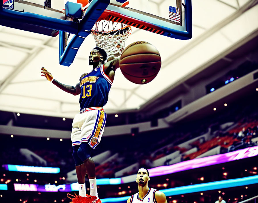 Basketball players in blue and yellow uniforms slam dunk.