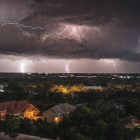 Town Nighttime Panorama: Lightning Storm, Rain, Streetlights