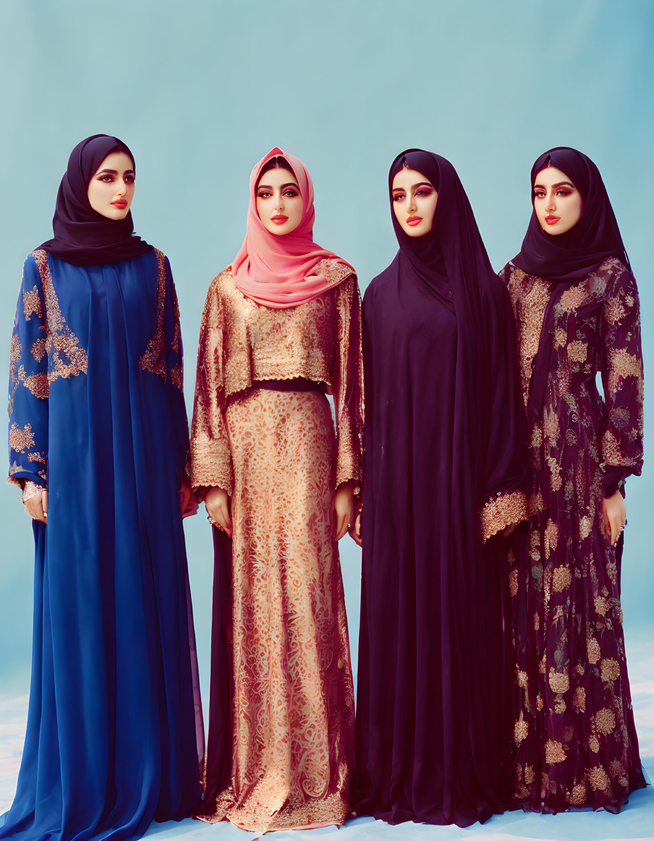 Four Women in Traditional Hijab and Abaya Against Blue Background