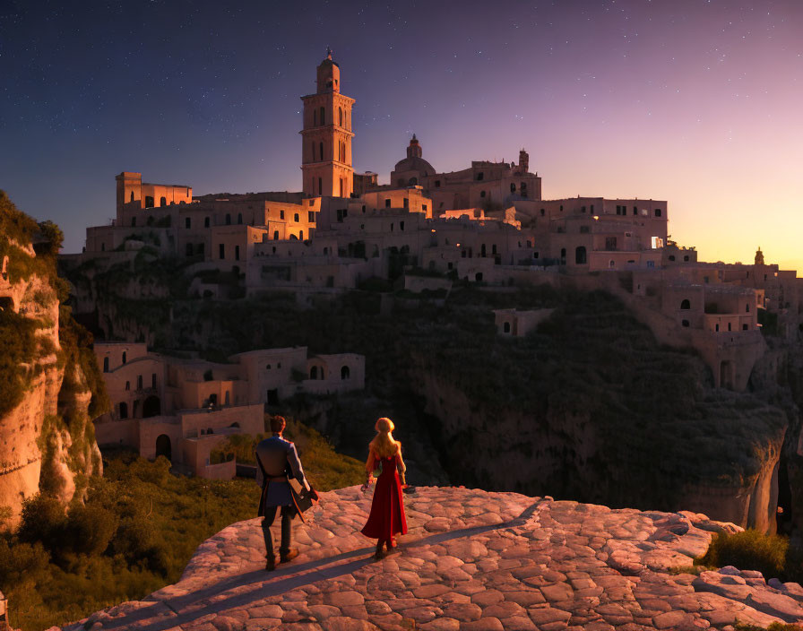 Couple admiring starlit hilltop town at dusk