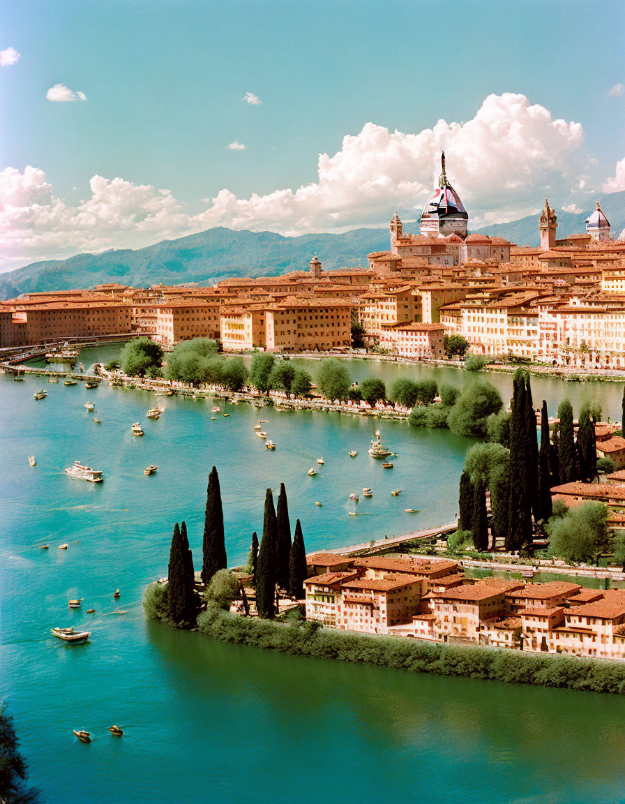 Scenic view of Florence with Arno River, historic buildings, boats, and cypress trees