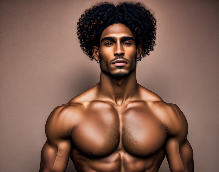 Curly-Haired Shirtless Man Displays Muscular Upper Body