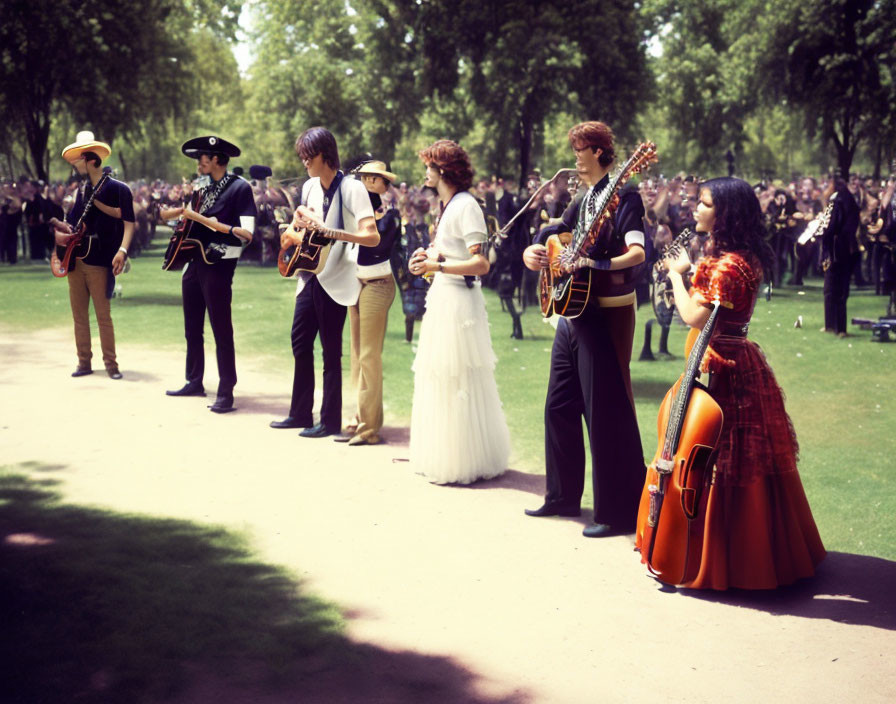 Musicians with guitars and violinist in colorful attire performing in park