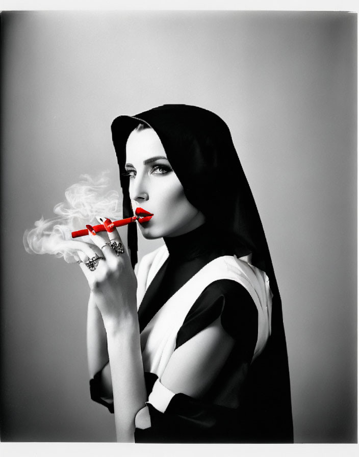 Monochrome photo of nun-like woman with red lipstick smoking cigarette