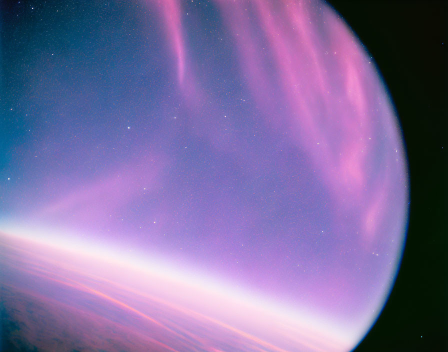 Starry Sky and Pink Aurora Borealis Over Earth's Curvature