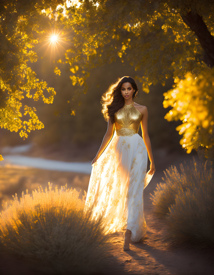 Woman in golden dress strolling among blooming yellow trees