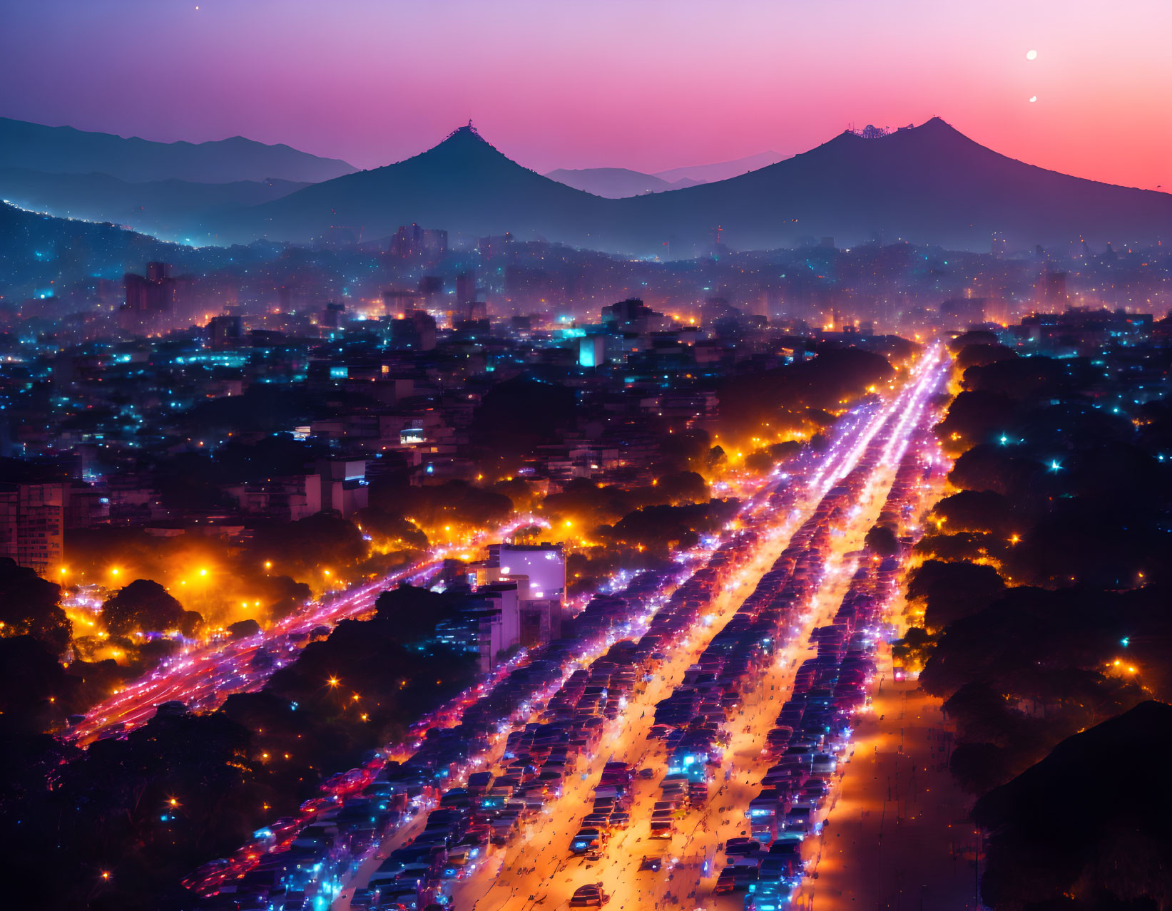 Cityscape at Dusk: Glowing Traffic Lights, Silhouetted Mountains, Colorful Sky