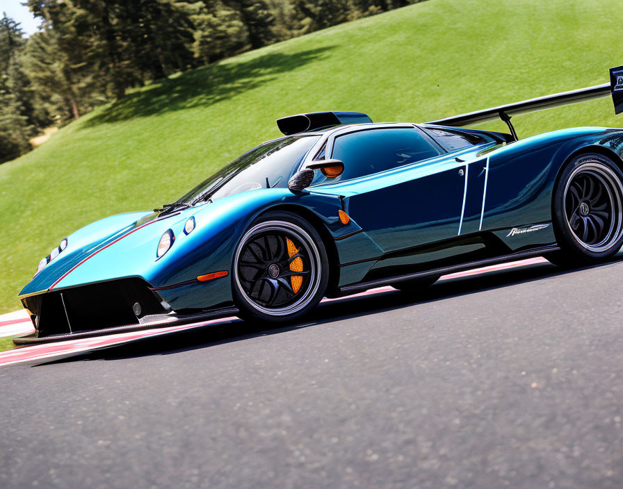 Blue sports car with racing stripes and rear spoiler on asphalt road.