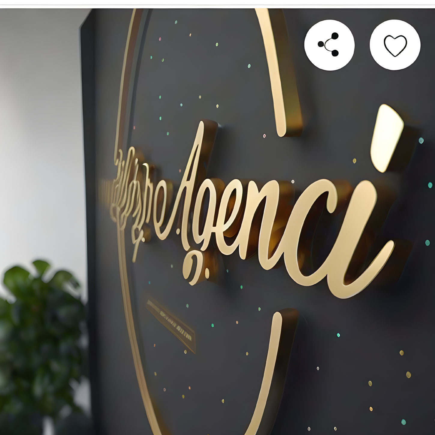 Stylish modern sign with gold 3D "Agency" lettering on textured black wall