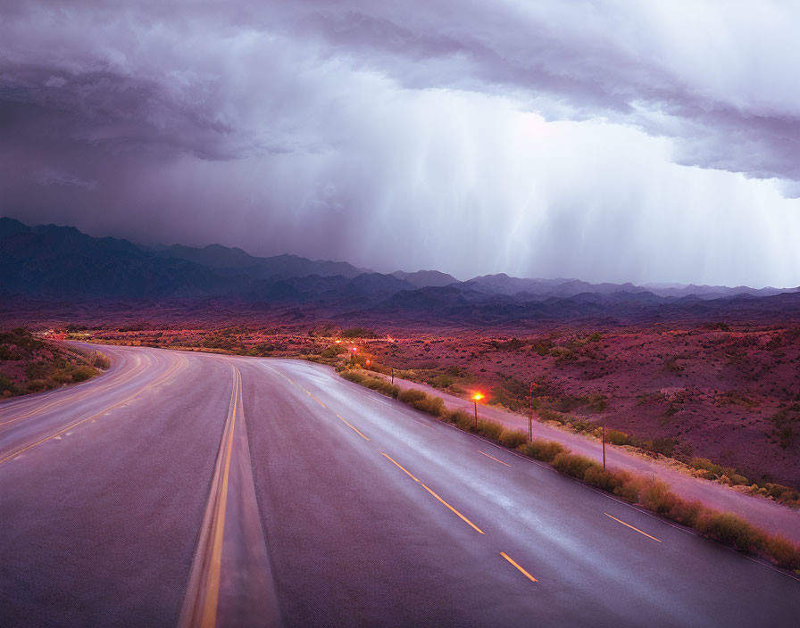 Curving desert highway under dramatic purple sky