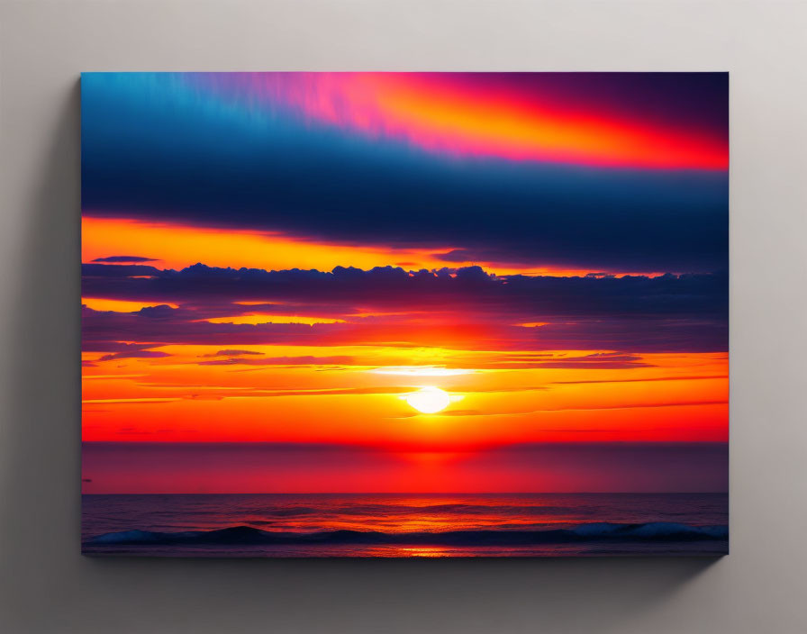 Vibrant sunset beach scene with red and blue skies reflected on ocean on square canvas.