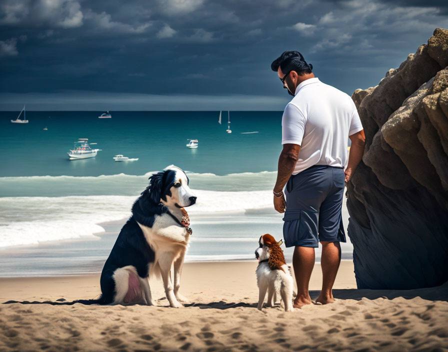 Man with two dogs on sandy beach looking at turquoise sea with sailboats under cloudy sky