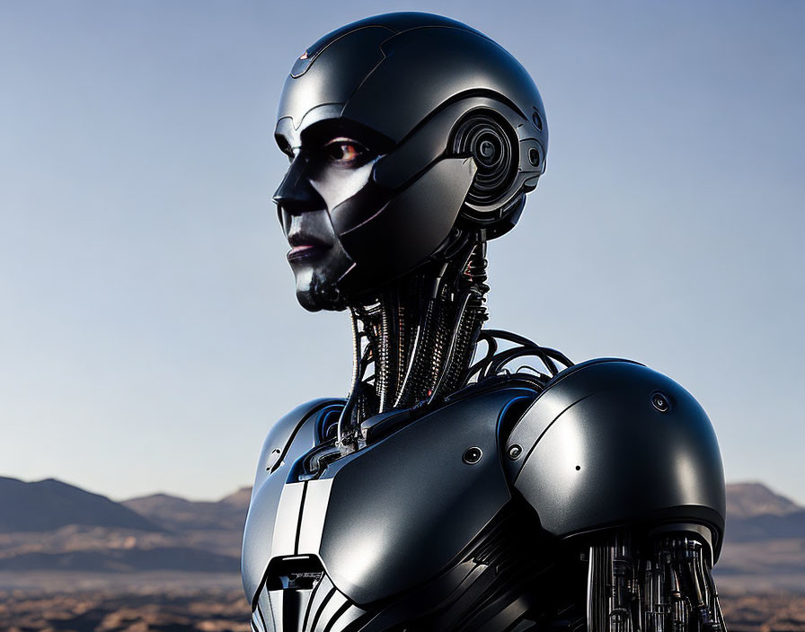 Sleek metallic humanoid robot against twilight sky and mountains