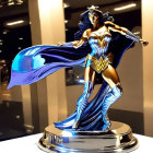 Shiny Wonder Woman Figurine with Flowing Cape Displayed at Convention