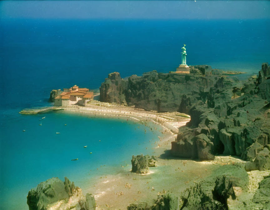 Turquoise bay, sandy beach, rocky cliffs, boats, statue, buildings, and pier in coastal