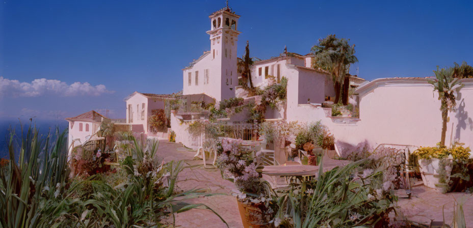 White-Walled Church in Mediterranean Village Landscape