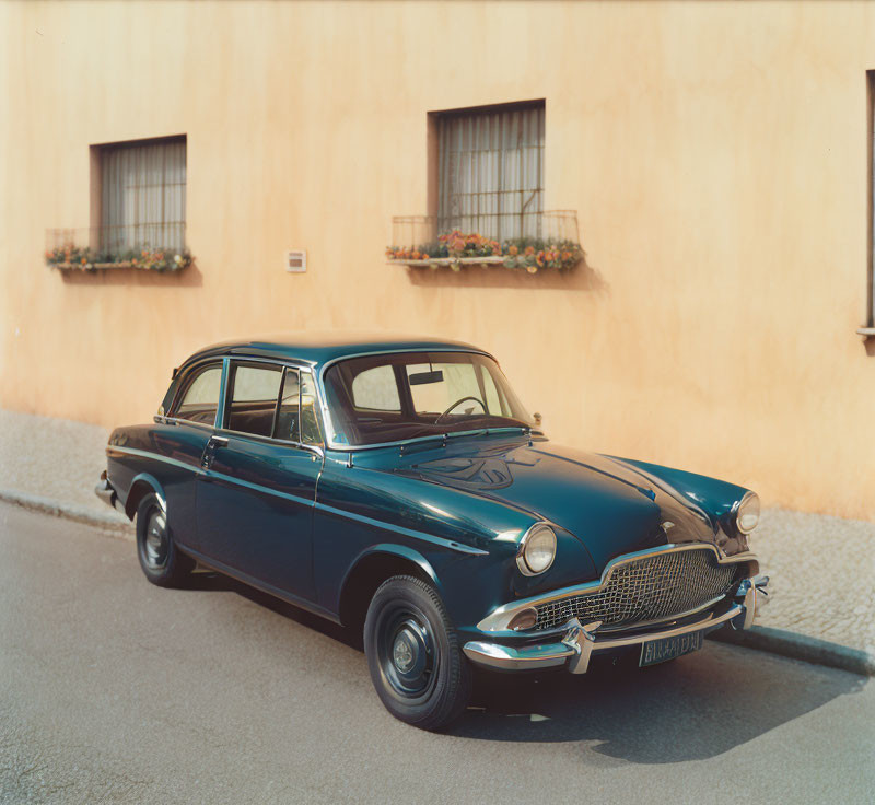 Vintage Blue Car Parked Next to Yellow Building with Flower Boxes