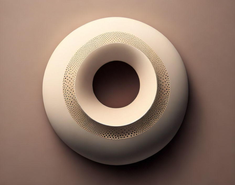 Beige torus with pattern of small holes on matching background