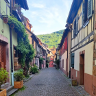 Quaint village with cobblestone street and half-timbered houses