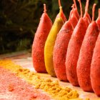 Ripe orange papayas on table with fruits scattered around