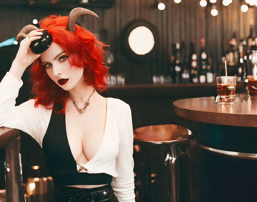 Red-haired horned figure in black and white outfit sitting at bar with drink