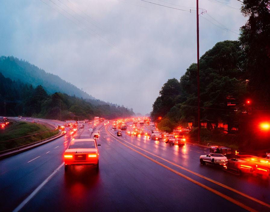 Highway at Dusk: Cars' Lights on Wet Road, Blue Sky