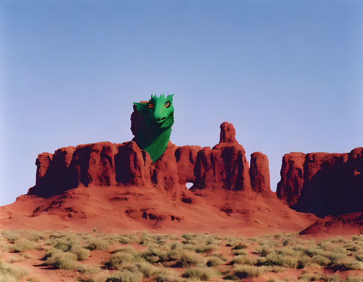 Green Knitted Dinosaur Toy on Red Desert Rock Formation