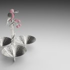 Colorful Metallic Toucan Sculpture on Silver Floral Structure with Pink Lotus Flowers