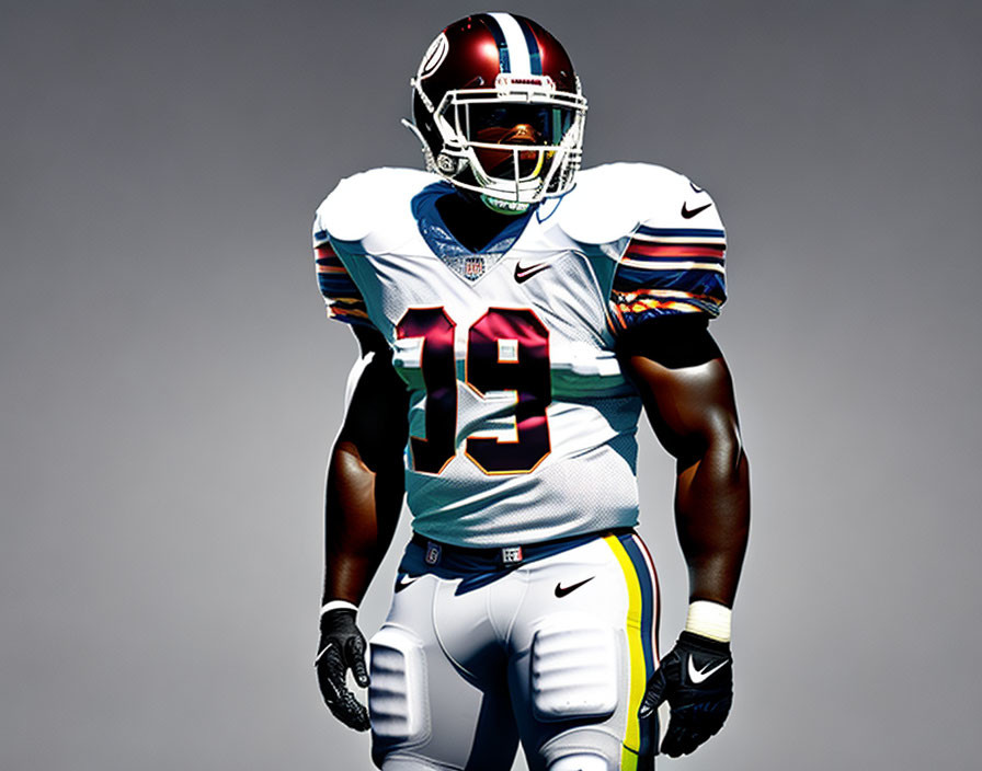 Athletic football player in colorful number 19 uniform on gray background