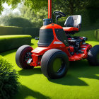 Red tractor with large wheels on grass pathway surrounded by green hedges