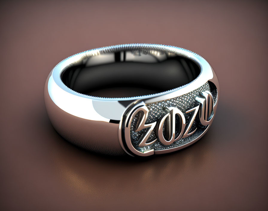 Silver and Black Ring with "2023" in Sparkling Stones on Brown Background