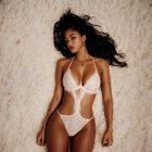 Woman in White Lingerie with Curly Hair and Accessories