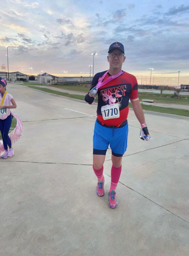 Colorful Running Outfit with Bib Number 1710, Cap, Glasses, and Knee-High