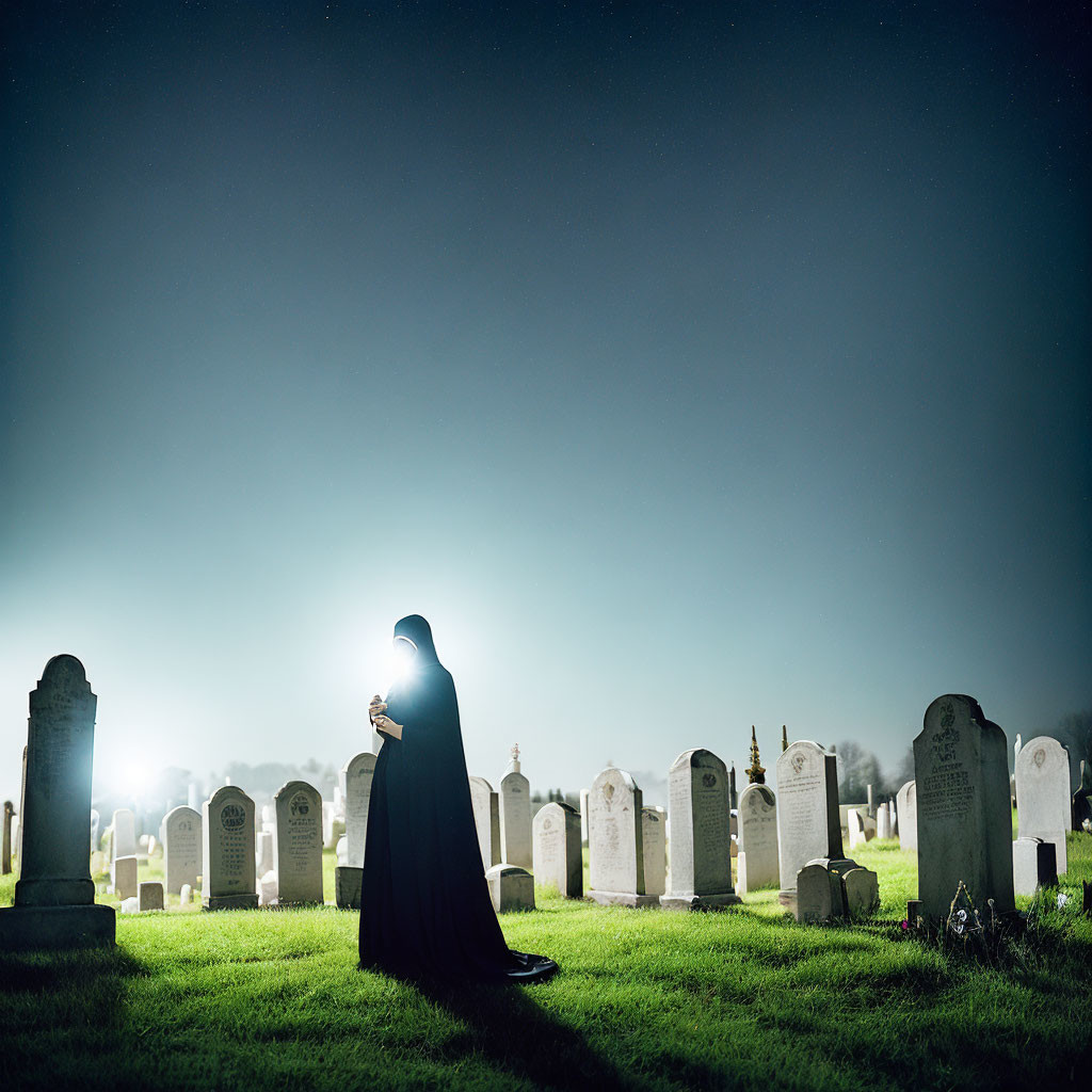 Cloaked figure in graveyard at night with soft glow