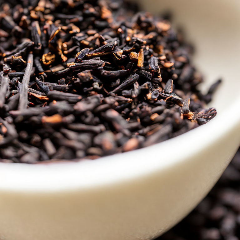 Dried Cloves in Bowl Showcase Rich Brown Texture