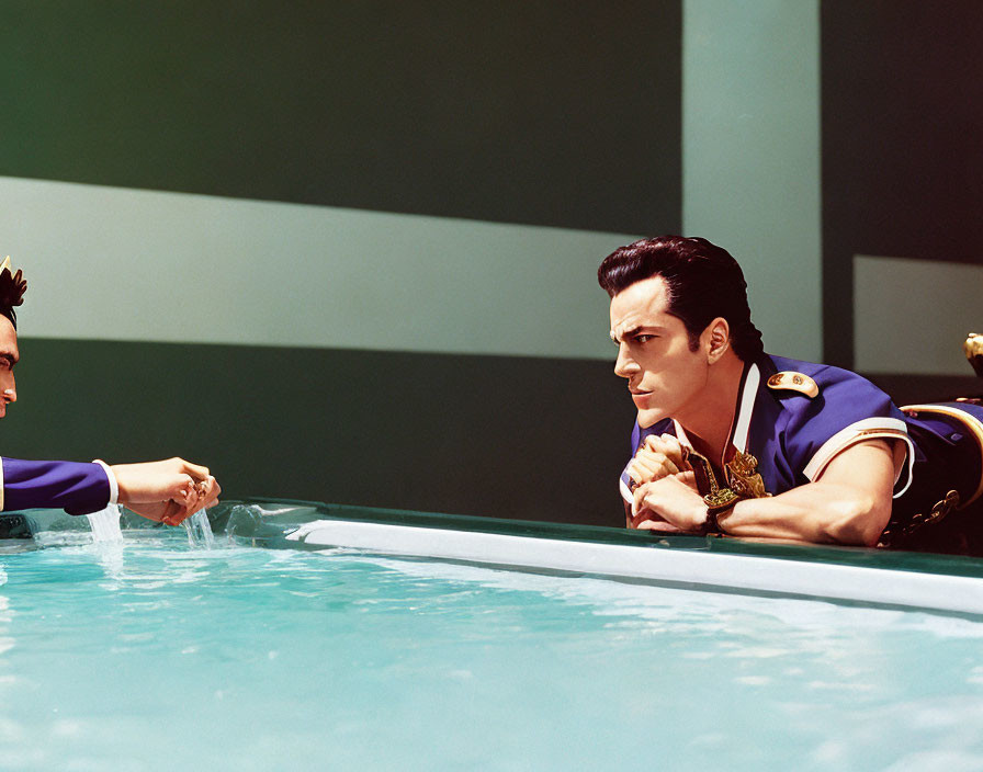 Animated male characters chatting poolside: one in water, one on edge