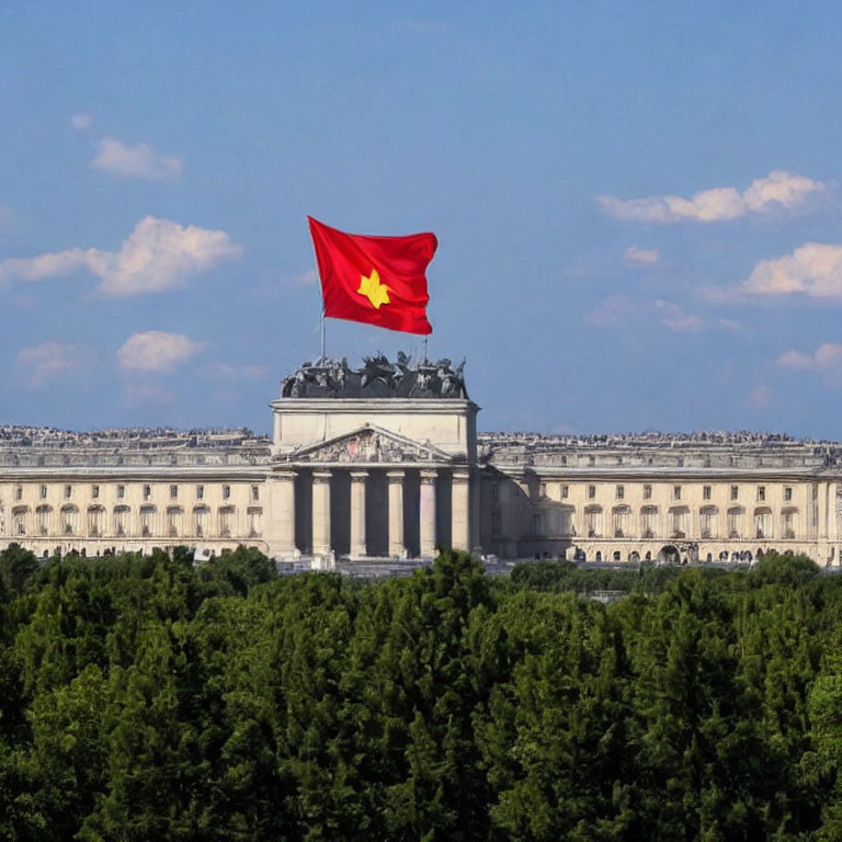 Vietnamese flag on neoclassical building with green trees and blue sky