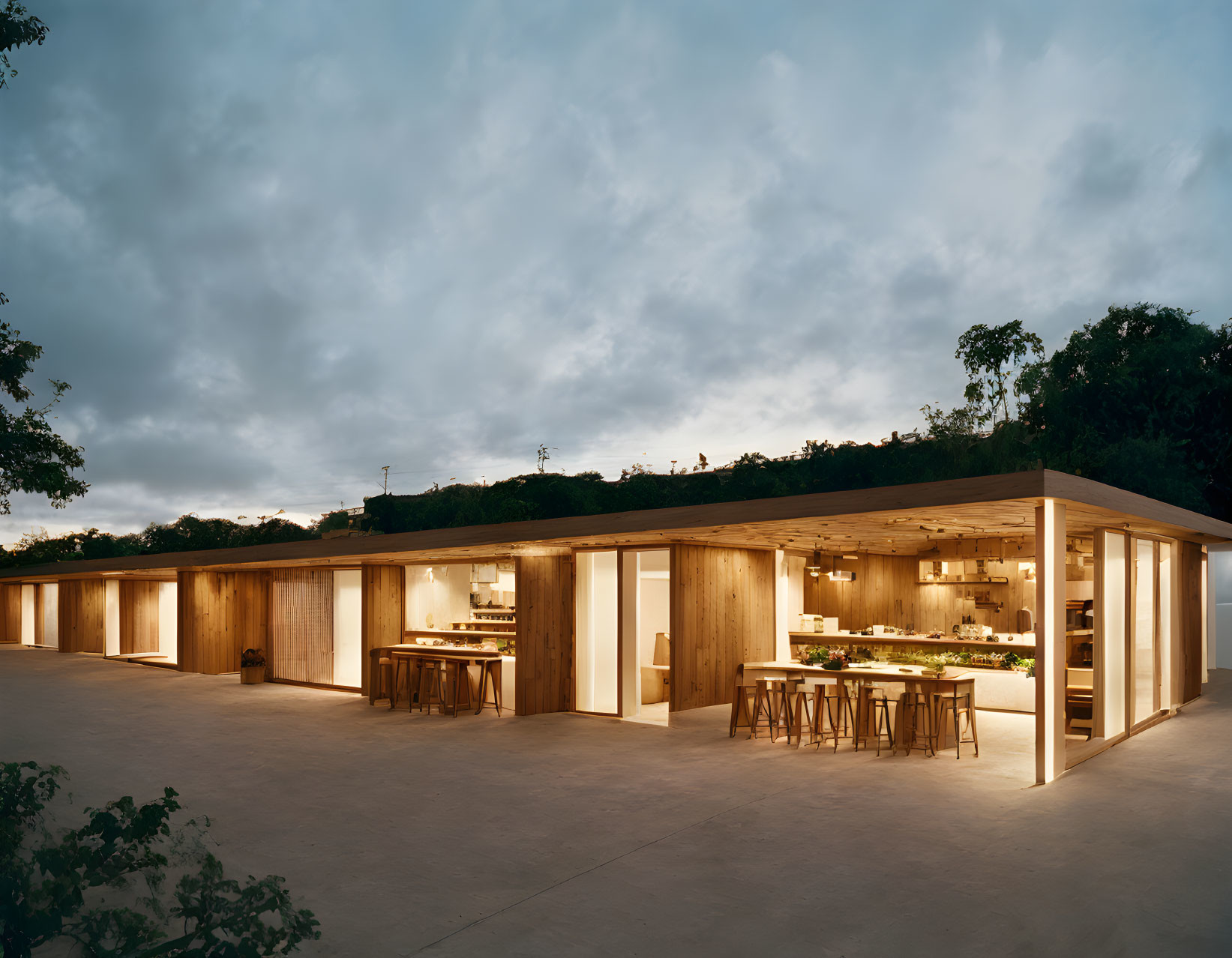 Wooden Pavilion with Floor-to-Ceiling Glass Windows in Forest Twilight