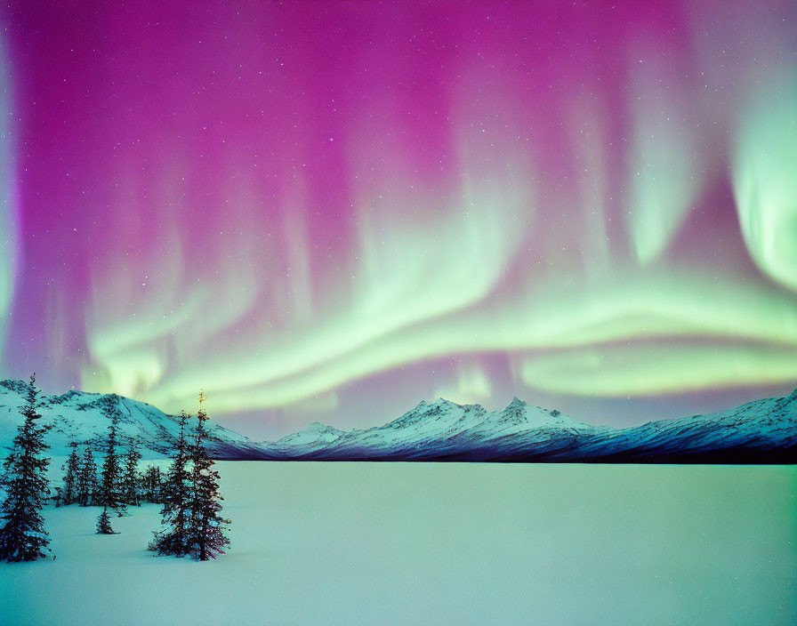 Colorful Aurora Borealis Over Snowy Landscape