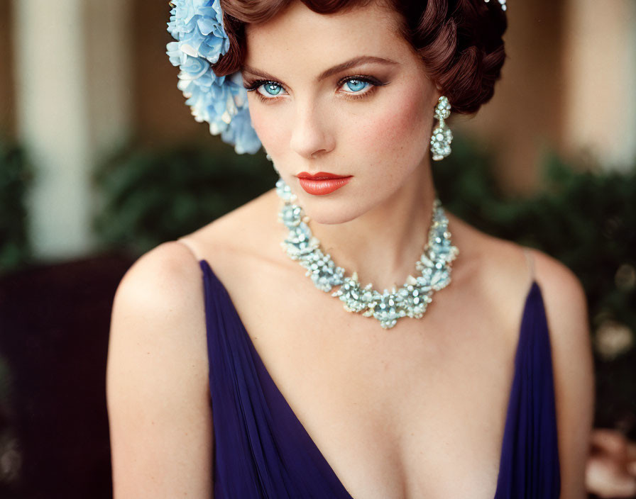 Woman with Blue Flowers in Hair and Pearl Necklace, Wearing Blue Dress