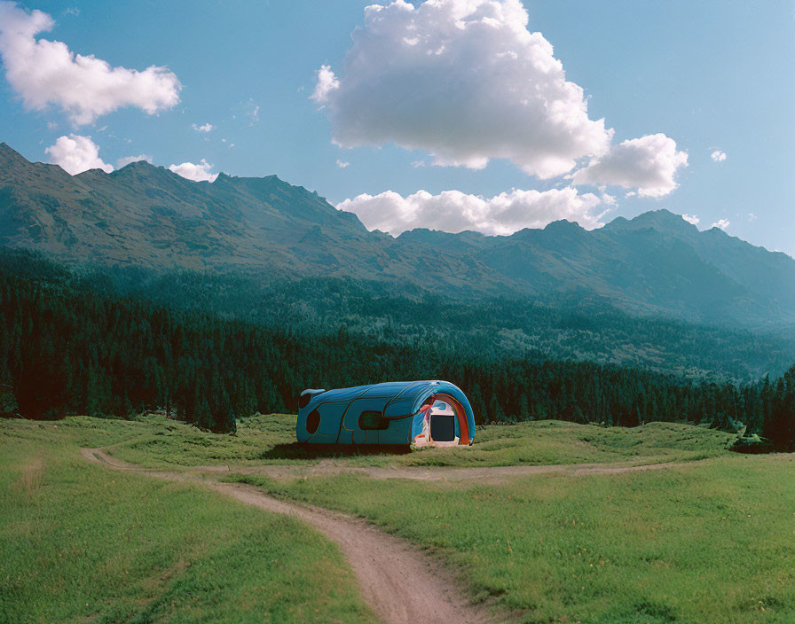 Colorful Camping Tent in Verdant Valley Surrounded by Forested Mountains