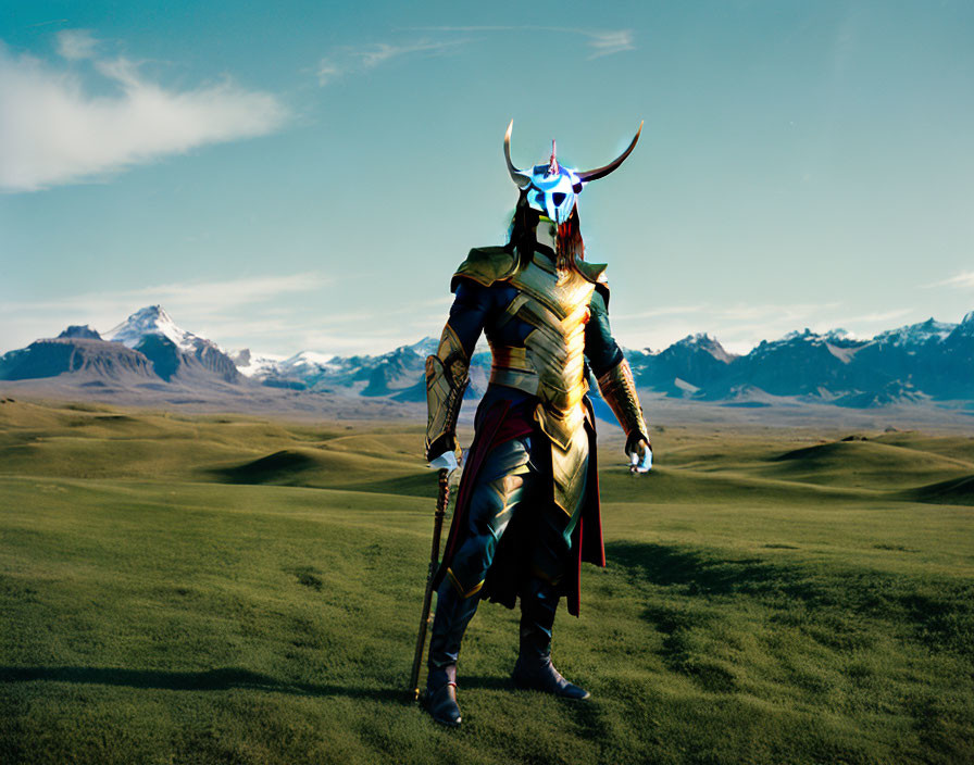 Fantasy character in horned mask on grassy plain with mountains