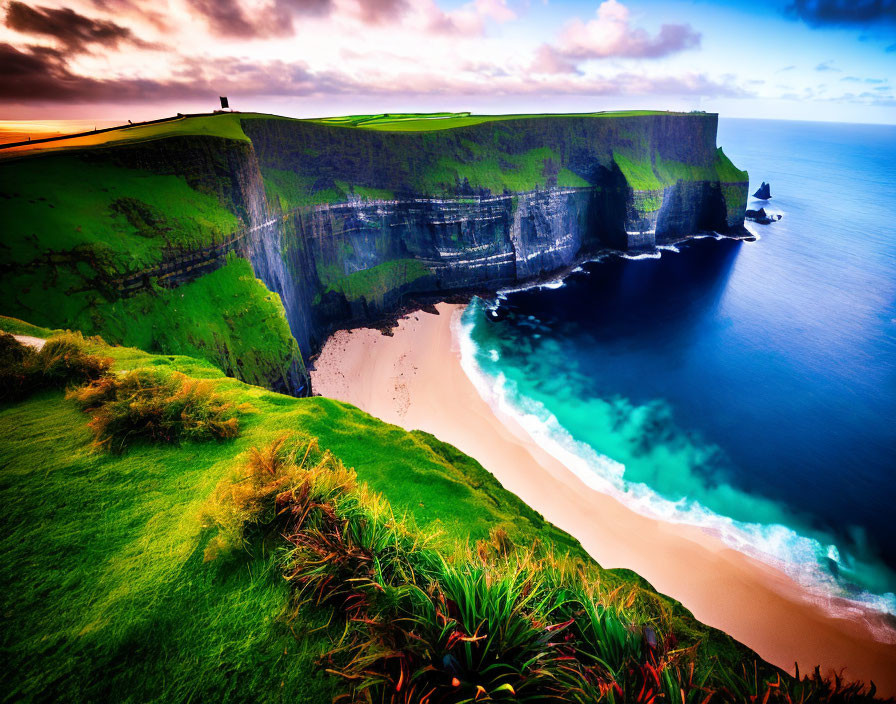 Scenic sunset view at Cliffs of Moher with lush greenery and beach