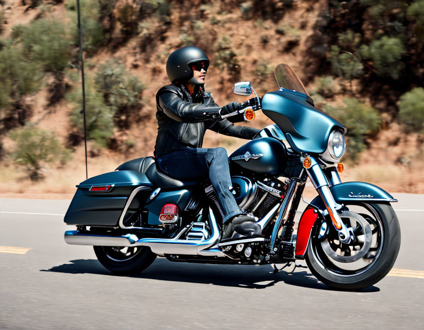 Touring motorcycle with large fairing, side cases, and custom paint on sunny day